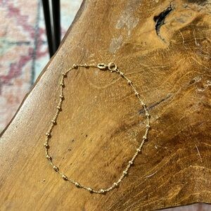 750 stamped delicate gold bracelet